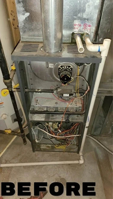 Old furnace system before HVAC replacement.